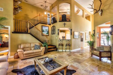 This picture depicts the stairwell up to the bonus area. Hardwood stairs and cut outs in the bonus room have recently been added for a more open and formal touch.