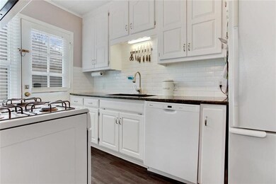 Bright and white kitchen with updated subway tile