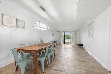 Dining area with wood finish floors
