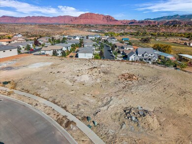Aerial view of residential area featuring a mountain backdrop