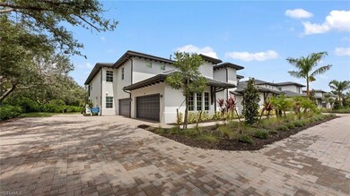 Mediterranean / spanish-style house featuring a ga