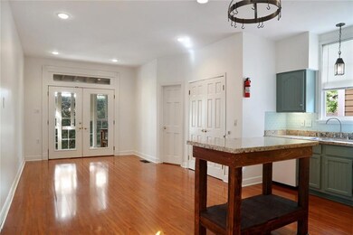 Kitchen, dining room/den, washer-dryer closet, hal