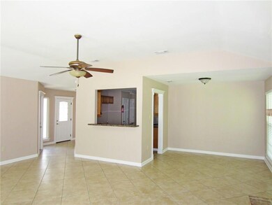 View of Foyer, Kitchen Area and Dining Area.