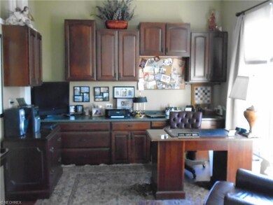 First floor office with built in cabinets , and ch