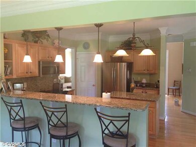 Kitchen - Granite, Hardwood, Pendant Lights, Crown