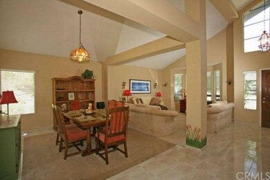 Large entry into formal living room and dining roo