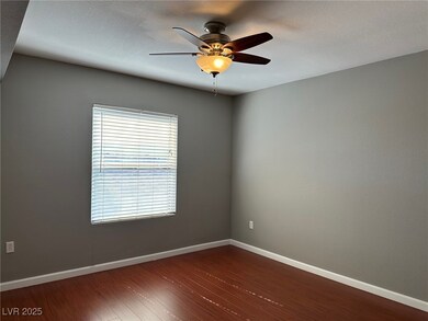 Unfurnished room with dark wood finished floors an