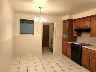 Kitchen with dining area. Cased opening door leads