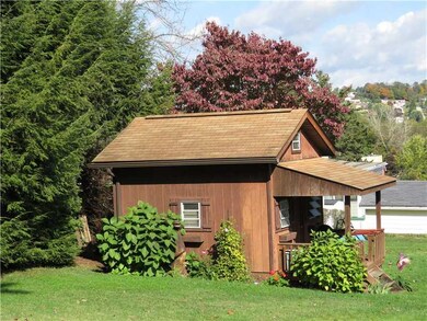 Storage. Storage shed on double lot is 2 story and