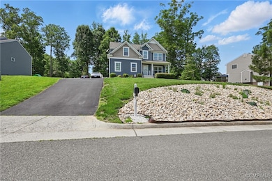 View of front of home featuring a front lawn and a