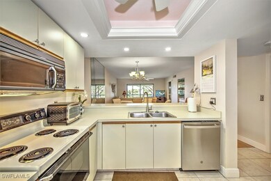 Kitchen with dishwasher, white range with electric