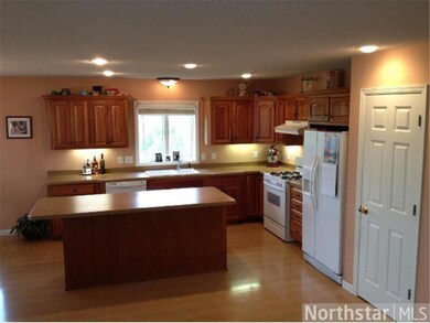 Kitchen has nice breakfast bar and lots of counter