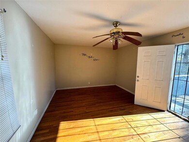 Foyer entrance featuring hardwood / wood-style flo