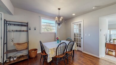 The door pictured in the middle leads to a washer/dryer room with extra closets (pictured later).