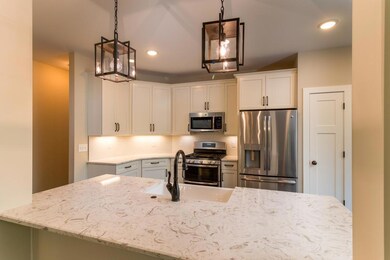 Example of the home being built on this lot