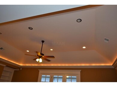 The Hearth Room ceiling has lighting that is aweso