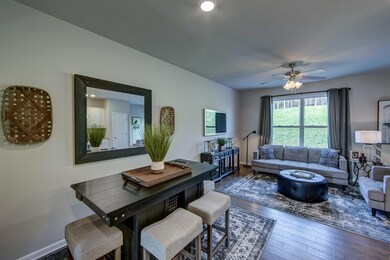 Lots of cabinets and island seating.  Granite and SS appliances.  All photos of another home.  Finishes will vary.