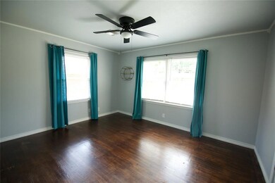 Spare room featuring ceiling fan, plenty of natura