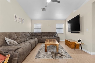 Living area with lofted ceiling, healthy amount of