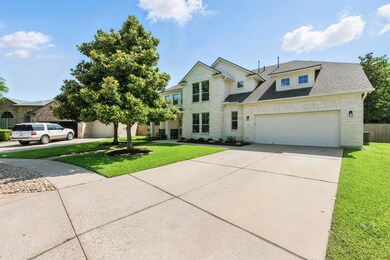 View of front of property featuring stone siding,