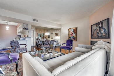 Living room featuring hardwood / wood-style floori