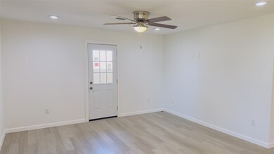 Living Area with door to Backyard