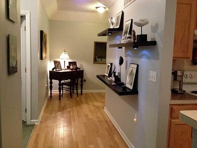 Entry/Foyer. Hallway leading into a convenient ope