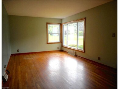 Big picture window allows  the bright sun in!