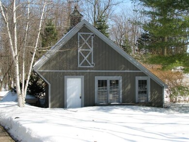 Carriage house as seen from front door.