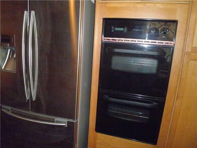 Kitchen. Built-in gas double oven and new stainles