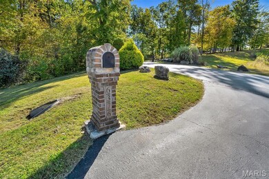 View of front of property with a front lawn