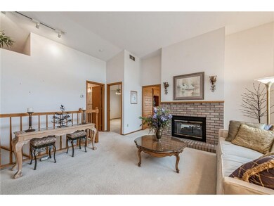 MAIN LEVEL LIVING WITH AN OPEN STAIRCASE TO THE LO