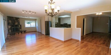 OPENS UP TO DINING AREA AND FAMILY ROOM
