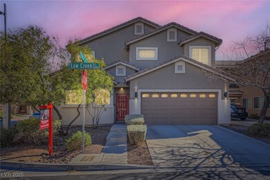 Traditional-style house featuring stucco siding, a