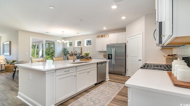 Kitchen featuring appliances with stainless steel 