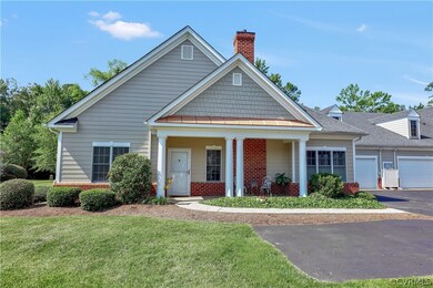 This three bedroom Emory Plan includes a sunroom,