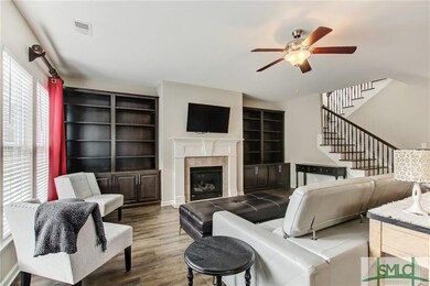 Great Room with built-in book cases, gas fireplace