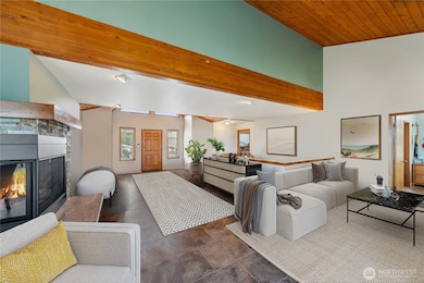 Rich vaulted wood ceilings and new gas fireplace and flooring. So inviting!!