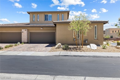 Side View of  property,  Decorative Driveway, and