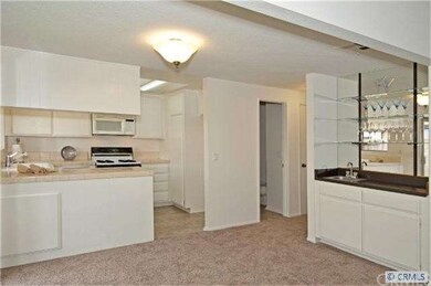 Open dining room with wet bar