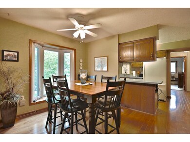 Very comfortable dining area with hardwood floors 