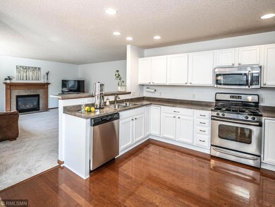 The kitchen is open to the living room area