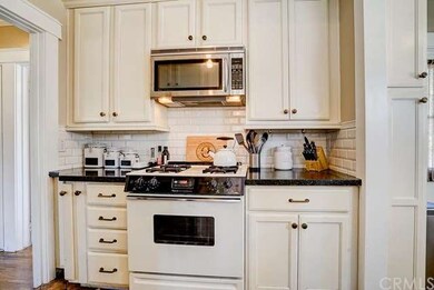 Remodeled kitchen with built-in microwave, gas sto
