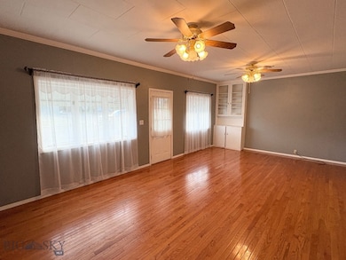Living room with hardwood floors.
