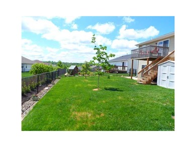 Yard. Fenced yard with mature landscaping around t