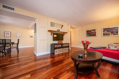 Another view of the living room with view of dinin