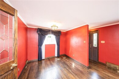 Original dining room is adjacent to the living roo