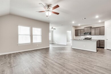 Unfurnished living room featuring light wood finished floors, ceiling fan, and recessed lighting