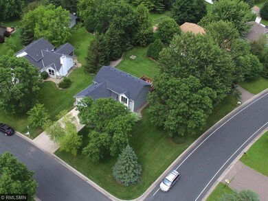1/3-acre corner lot with plenty of mature trees an