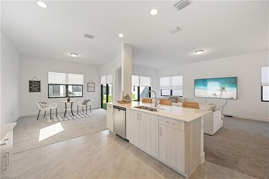 Kitchen with visible vents, open floor plan, light